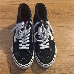 Vans Black and White High-Top Sneakers
